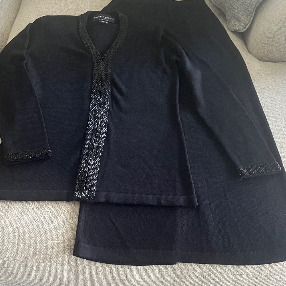 Black 2 pc sweater skirt and top. Beaded